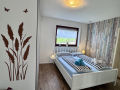 Schlafzimmer mit grossem Kleiderschrank - Boutique Ferienwohnung Bodensee